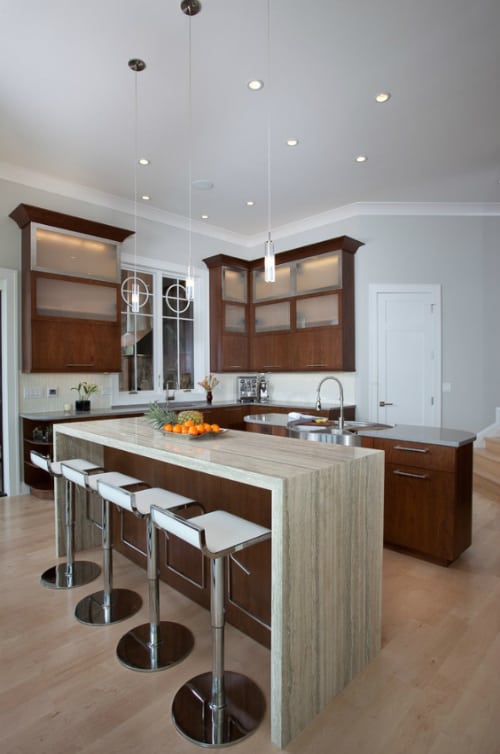 Two side waterfall edged granite kitchen island